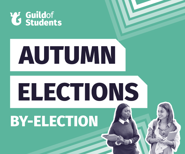 A green background with 2 students one holding a notebook with the words Autumn Elections