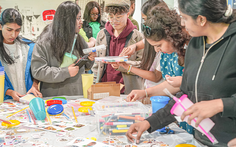 a photo of students at a crafts event