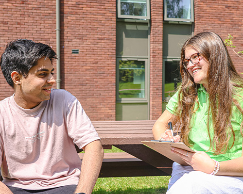 reslife staff and students talking