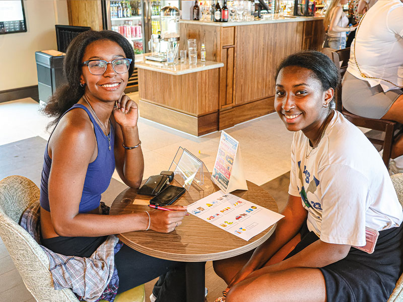 an image of students at an event in joe's bar