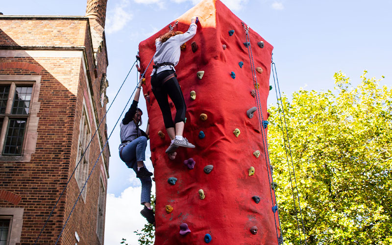 a photo of students rock climbing