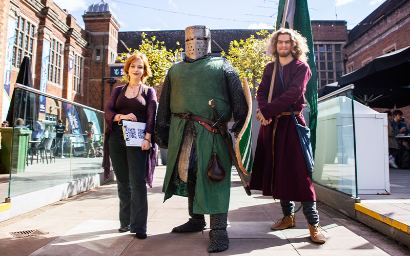 a photo of a group of students wearing armor