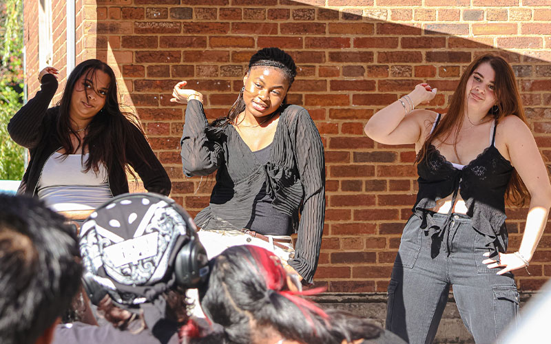 a photo of students dancing