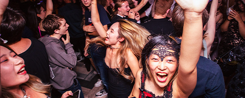 students dancing at a guild club night