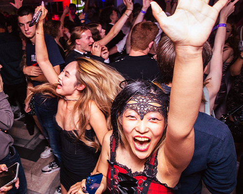 a singer at an event in the underground at the guild