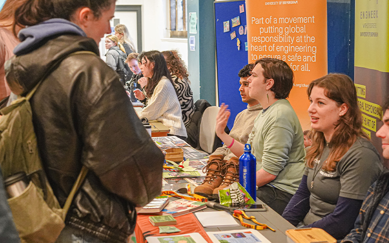 students engaging at a fair