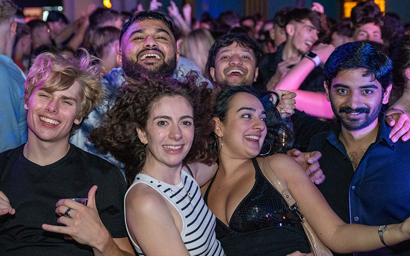 a group of students at a guild club night