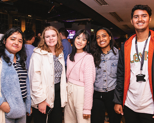 a group of students smiling