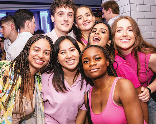 a group of students smiling